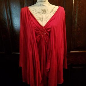 Red sequined designed woman's top.